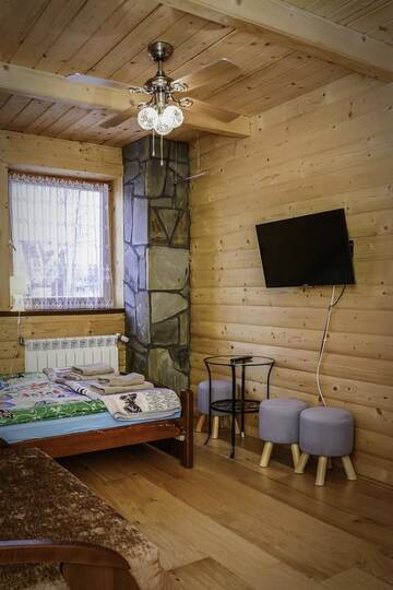 Фото номера Трехместный номер Загородные дома Domek Koniec Świata г. Dzianisz 3
