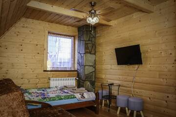 Фото номера Трехместный номер Загородные дома Domek Koniec Świata г. Dzianisz 5