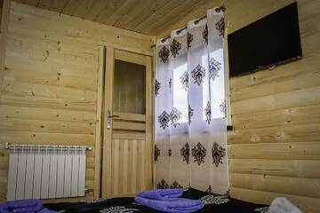 Фото номера Небольшой двухместный номер с 1 кроватью Загородные дома Domek Koniec Świata г. Dzianisz 5